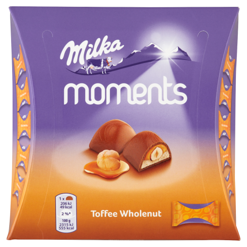 Milka Moments alpesi tejcsokoládé karamellízű töltelékkel és egész mogyoróval 11 db 97 g